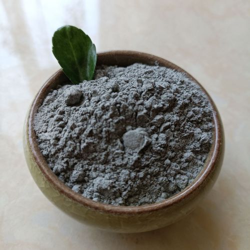 Fly ash is a fine ash that is collected from the flue gas after coal combustion.
